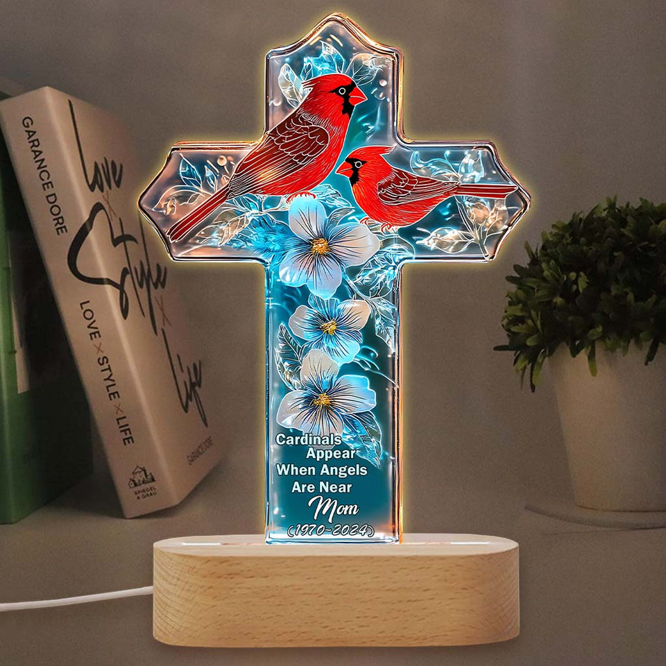 Les cardinaux apparaissent quand les anges sont proches.
 - Socle lumineux personnalisé pour plaque commémorative