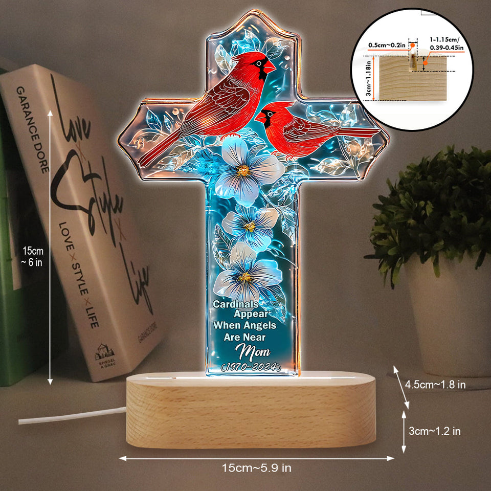 Les cardinaux apparaissent quand les anges sont proches.
 - Socle lumineux personnalisé pour plaque commémorative