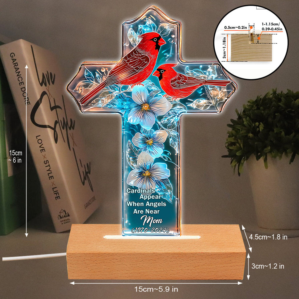 Les cardinaux apparaissent quand les anges sont proches.
 - Socle lumineux personnalisé pour plaque commémorative