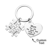 You're The Piece That Holds Us Together Puzzle Heart - Personalized Mother Puzzle Heart Keychain